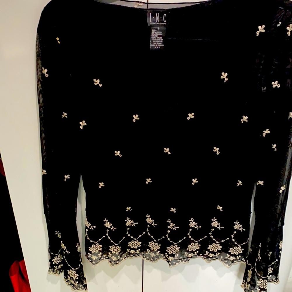INC blouse size small made of nylon & spandex